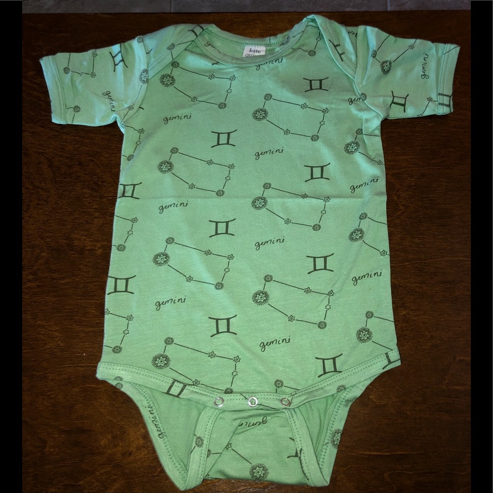 KATE QUINN GEMINI ONESIE